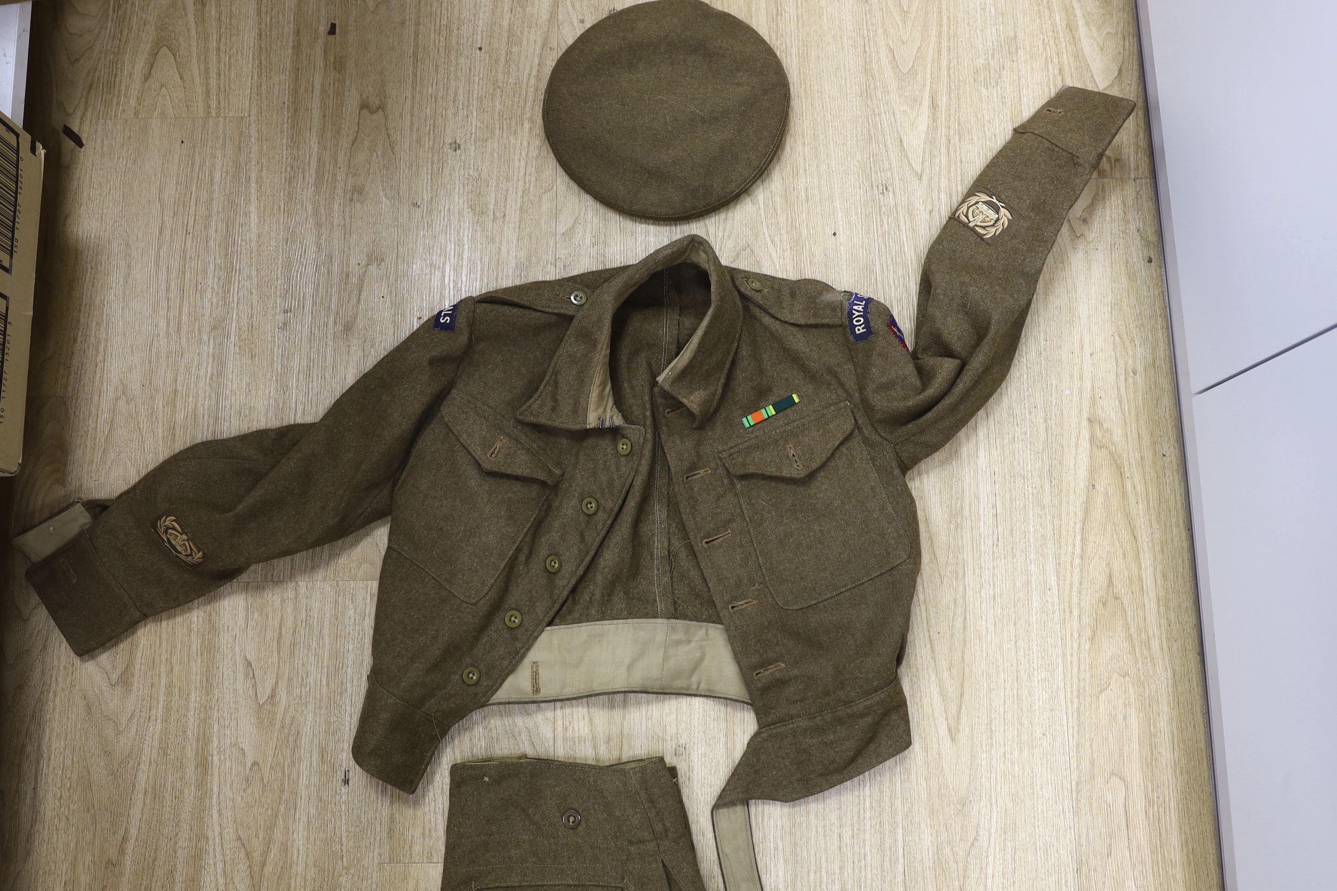 Military interest - a Royal Corps of Signals army uniform, ration kits, field service pocket book, glasses to be worn with a respirator, various badges, knives etc.